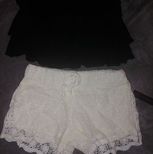 Brand new shorts & used black skirt